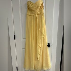 Brand new with tags cute yellow dress from David’s bridal